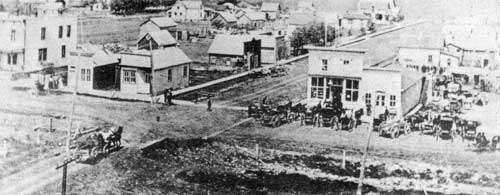 Bank of Montreal (centre left, at the street corner) in Plum Coulee. This was the scene of the armed robbery and murder of the bank manager by Krafchenko on 3 December 1913.