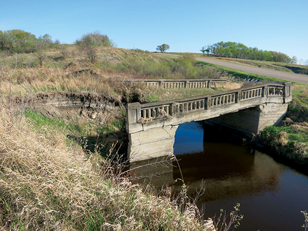 This abandoned concrete bridge in the Rural Municipality of Daly, near the village of Bradwardine, was built in 1916.