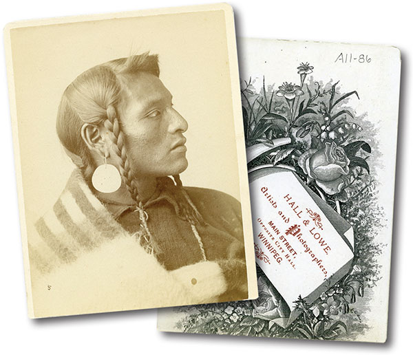 Hall & Lowe cabinet photo (front and back) of an unidentified man with braided hair and shell earring.