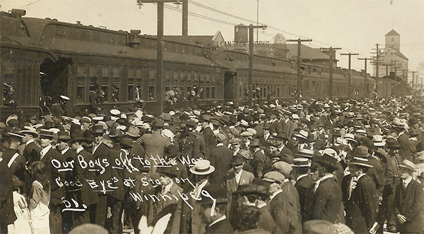 “Our boys off to the War.” Winnipeggers at the CPR station send their sons and daughters to the European battlefields.