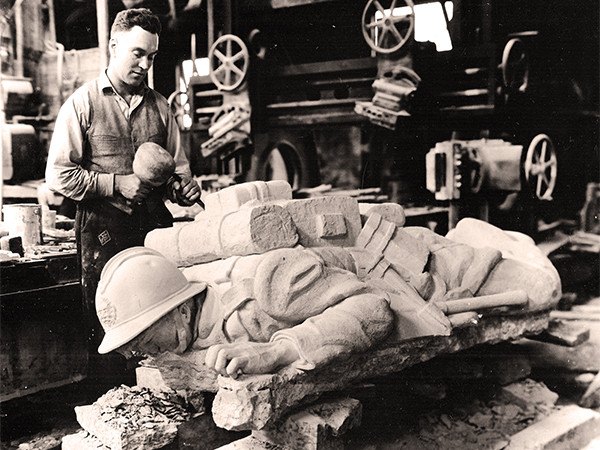 Sculptor Hubert Garnier (1903–1987), who apprenticed with Mount Rushmore creator Gutzon Borglum, at work in his Winnipeg studio on the fallen soldier featured in his Belgium War Memorial on Provencher Boulevard.