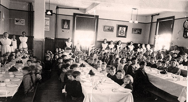 Children in the dining room at the Home of the Friendless, circa 1925