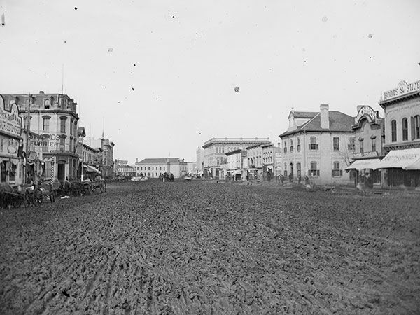 A view of muddy Main Street looking north from the post office