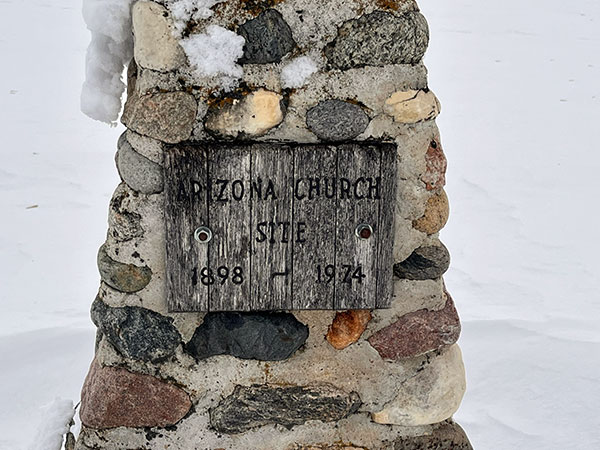 Wooden plaque on the Arizona United Church monument