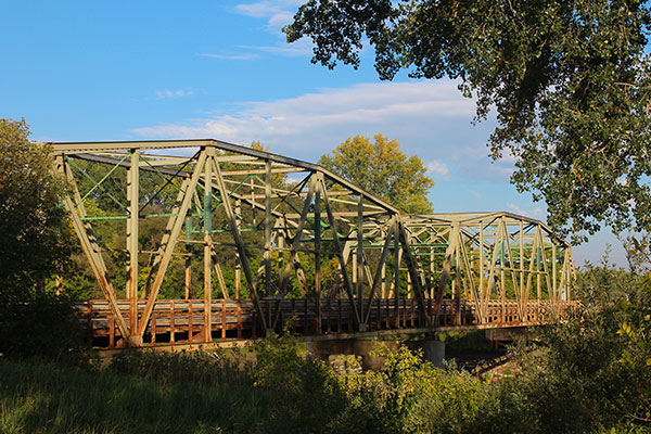 Steel through truss bridge over the Assiniboine River at Baie St. Paul