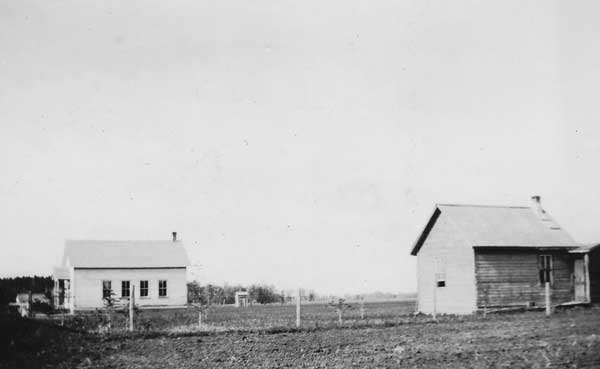 The original Borshaw School building at left with the teacherage at right