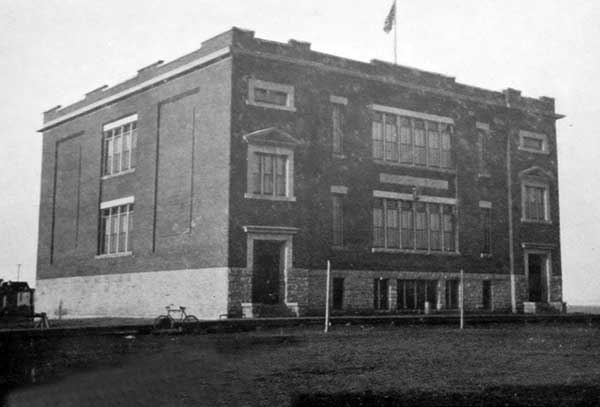 The newly constructed Brooklands “Red School,” made from distinctive salmon-red bricks from the Leary Brick Works
