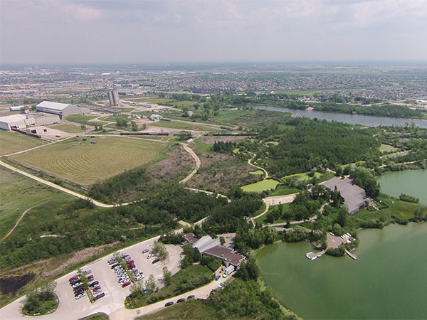 Aerial view of the former Canada Cement plant (left background) and its clay quarries (right foreground), now lakes at FortWhyte Alive