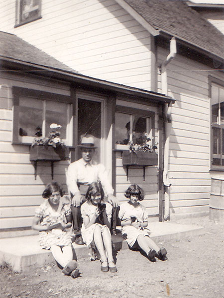 Johnson’s (originally Watt’s) general store with proprietor H. T. Johnson and his stepdaughters Alice, Marion, and Jean