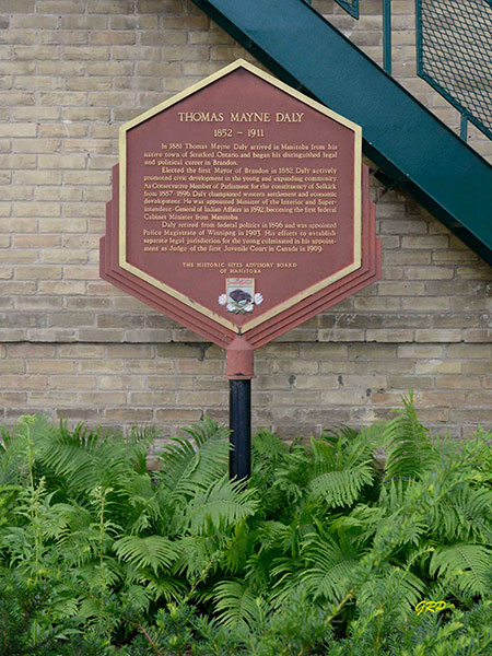 Daly commemorative plaque beside the museum