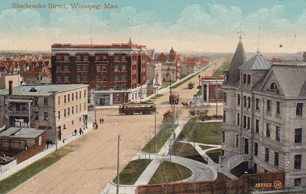 A view from the top of Fire Hall No. 5, with the Manitoba Deaf and Dumb Institute at right and the Casa Loma Building in the background, behind the streetcar
