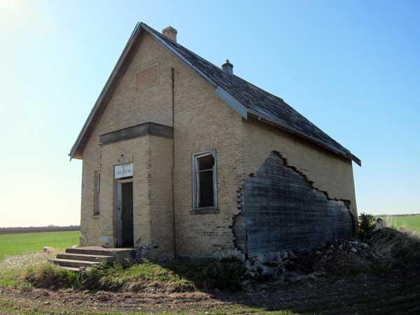 The former Eldon School building showing damage to brick veneer