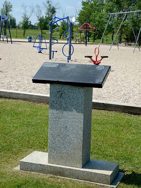 Commemorative plaque at the former site of Emesville School