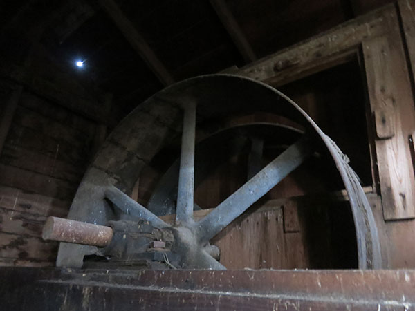 Grist mill machinery inside the Hoffman family grain elevator and mill