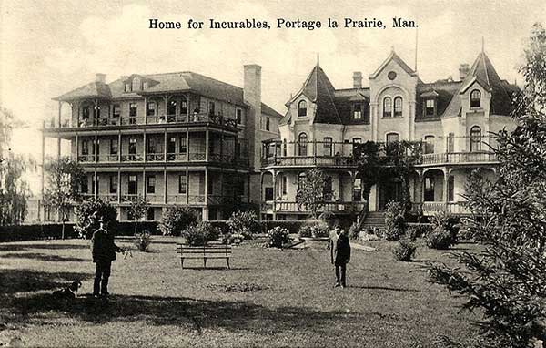 Postcard view of Home for Incurables with original building at right and addition at left