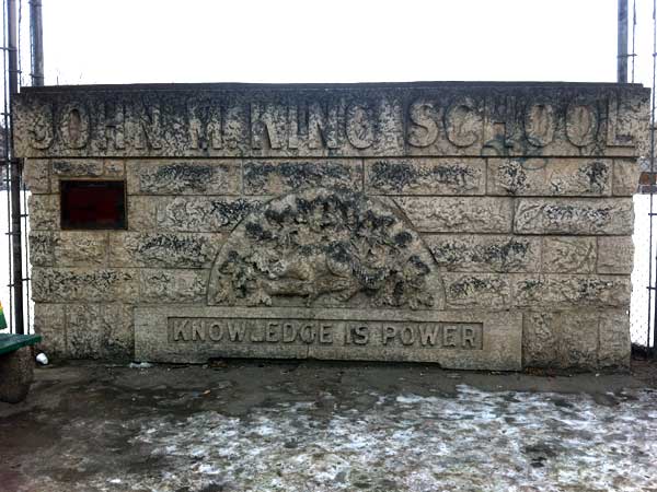 Name stone that appeared over the entrance to the original John M. King School on the grounds of the present building