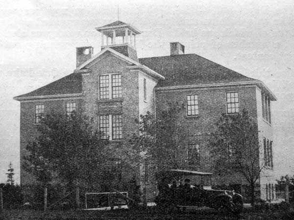 The Kenton Consolidated School building, erected in 1920, was lighted with electricity. There was a teacherage, skating rink, and curling rink on its seven-acre grounds