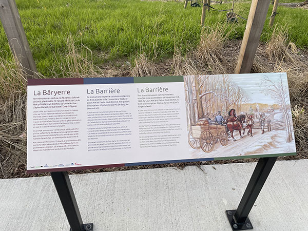 Interpretive signage at La Barriere monument