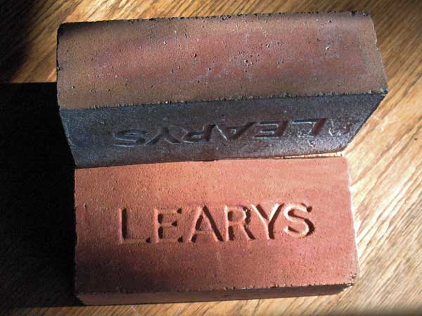 Early pressed brick from the Leary facility, circa 1911. The foreground brick was salvaged from the former Brooklands School building in Winnipeg during its demolition
