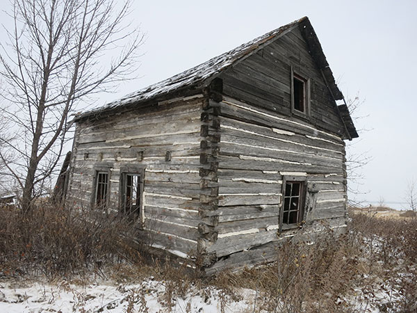 Remains of a Manitoba House replica building from the 1970s