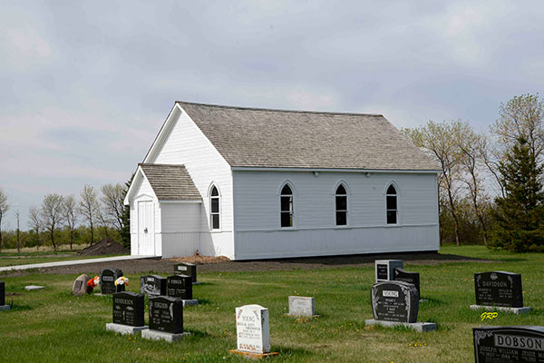 The former Archibald United Church building at the Manitou Cemetery