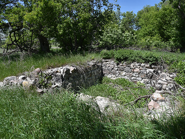 Stone foundation of the former McLaren house near the outhouse