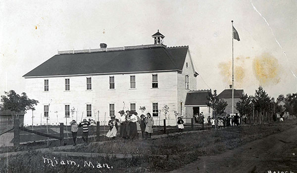 Postcard view of the “Red School” with its 1903 addition