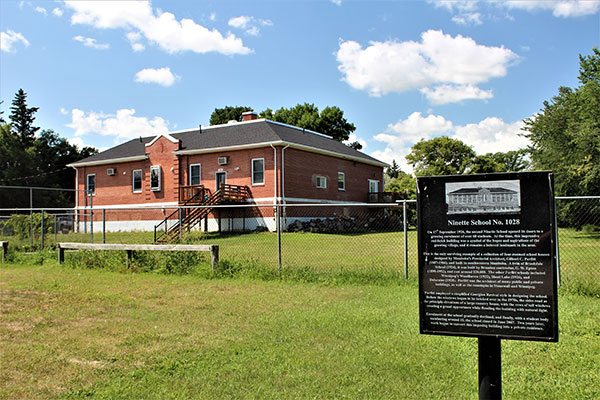 The former Ninette School building and commemorative sign