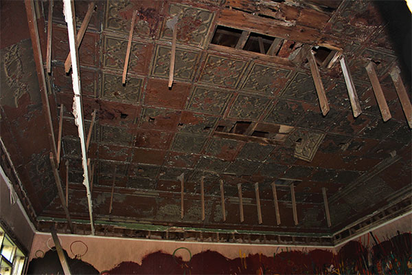 Pressed metal ceiling tiles of the former Northcote School building