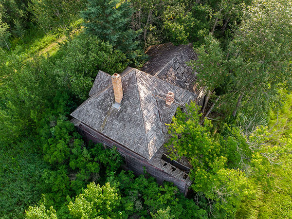 Aerial view of the former Canadian National Railway station at Piney