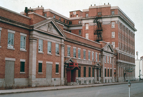 Former Canadian Northern Railway depot beside the Prince Edward Hotel in the background