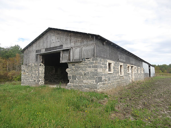 A stone barn built by prisoners is still in use today