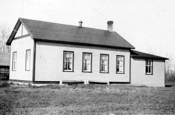 The first Roaring River School building