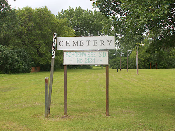 Former location of Schoenwiese School, marked with the sign that was once displayed over the entrance door to the building