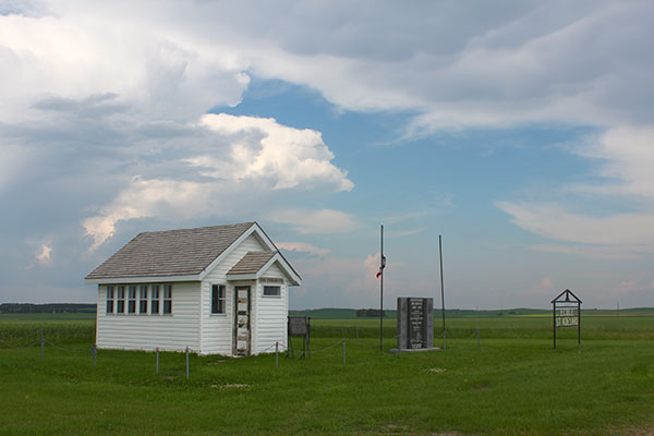 St. Adelard School commemorative sign and replica