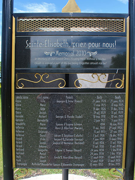Commemorative sign in Ste. Elizabeth Roman Catholic Cemetery