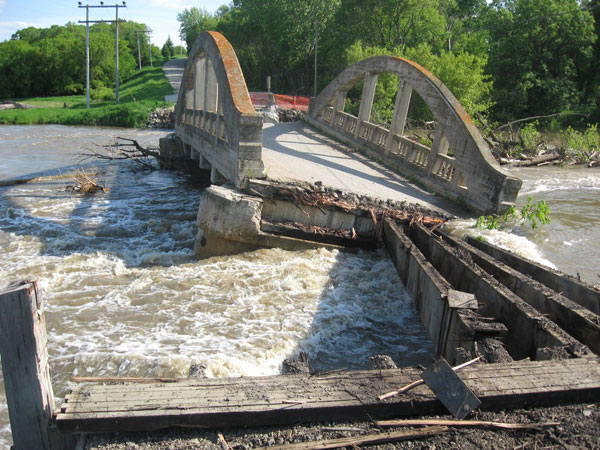Bridge being damaged by flood water