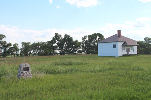 The former Verona School building and commemorative monument