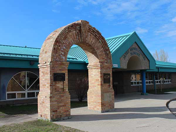 Commemorative arch in front of Mary Montgomery School
