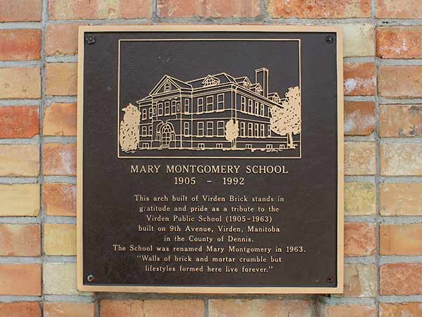 Plaque on the commemorative arch in front of Mary Montgomery School