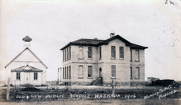 Postcard view of the first (1880s) and second (1901) Waskada Schools