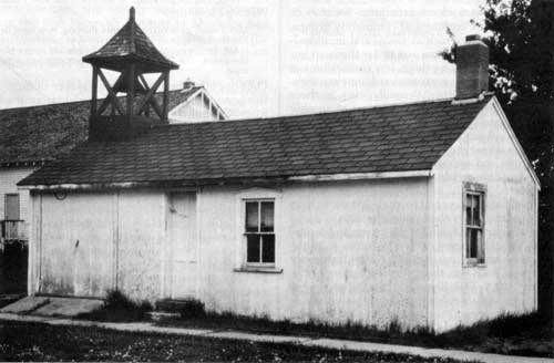 In the 1930s and 1940s this small frame building, measuring about 12 feet by 30 feet, and identified on 1910 maps as 64 Brambel Avenue, served not only as the Napinka fire hall and jail, but also as the women&rsquo;s rest room. The windows section to the right of the door was devoted to the rest room.