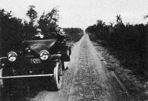 &ldquo;This road looks inviting to travel upon, one of the good roads in Manitoba. This you will find all the way between Portage la Prairie and Curtis.&rdquo; 1916