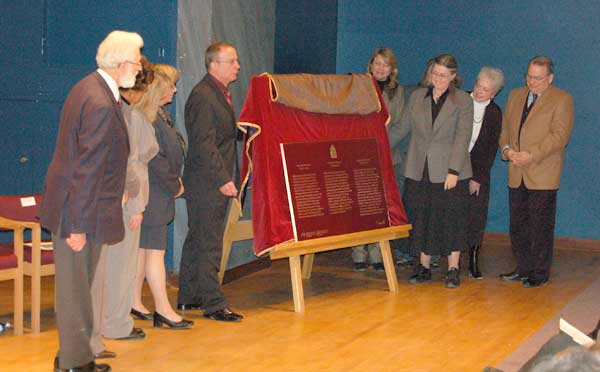 A plaque commemorating William Hespeler was unveiled at the University of Winnipeg. Witnessing it were (L-R): Dr. Robert O&rsquo;Kell, Manitoba Representative, Historic Sites and Monuments Board of Canada (behind); Dr. Claudia Wright, Acting Vice-President (Research & Graduate Studies), University of Winnipeg; Dr. Angelika Sauer, Associate Professor of History, Texas Lutheran University; Ms Dawn Bronson, Superintendent, Manitoba Field Unit, Parks Canada Agency; Mr. Helmut Hesse, President, German-Canadian Congress (MB) Inc.; Ms Cindy Tugwell, Executive Director, Heritage Winnipeg; Ms Mary DeGrow, great-great-granddaughter of William Hespeler; Ms Penny McMillan, President, Heritage Winnipeg; Ms Bonnie Korzeniowski, MLA, Province of Manitoba; Mr. Grant Nordman, Councillor, City of Winnipeg