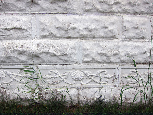 Concrete blocks used to build a private residence in Austin have at least two different patterns on their exterior surfaces.