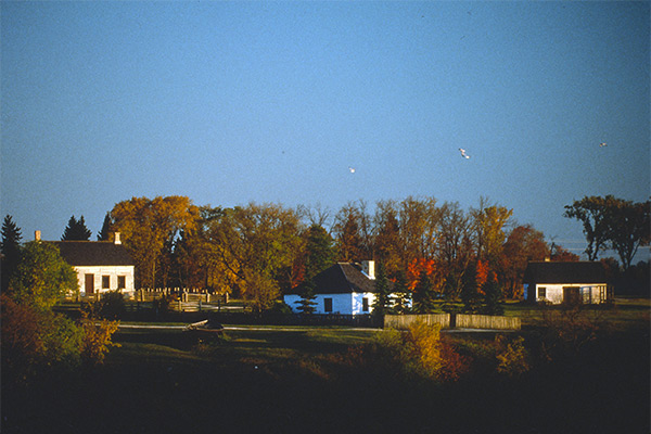 Lower Fort Garry National Historic Site, 1994. The buildings, left to right, include the Farm Manager&rsquo;s Cottage that was moved to the site in 1970, the restored Ross Cottage, and the reconstructed Blacksmith Shop.