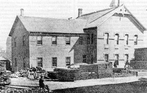 Brandon’s first school. The portion at right was built in 1881. The part at left was added in 1883.