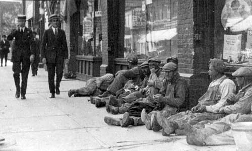 Figure 2: Unidentified workmen having lunch on Main Street, 1922.