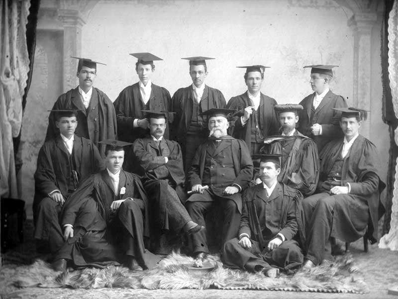 Graduating class of the BA in Honours Natural Science, University of Manitoba, 1894. The three science instructors are in the middle - Edgar B. Kenrick (looking impatient), George Bryce (with the beard), and George J. Laird (whose unusual cap presumably reflects his PhD from the University of Breslau). The names of the nine members of the graduating class are known from University records, but most names have not been attached to faces. Charles Camsell (see text) is in the second row, far left.