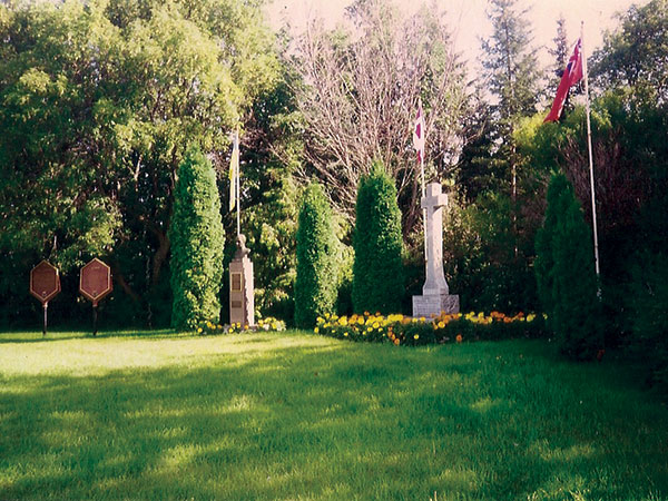 The Cross of Freedom at the Trembowla Cross of Freedom Historical Site and Museum, along with plaques erected by the Historic Sites Advisory Board of Manitoba.